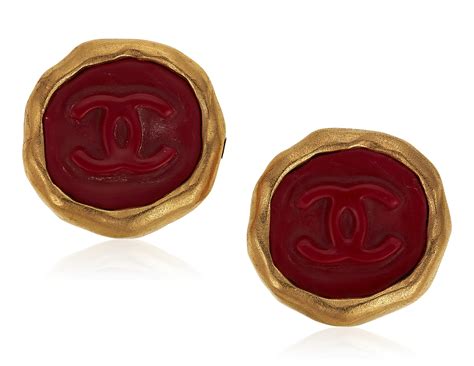 chanel earrings plastic round twit